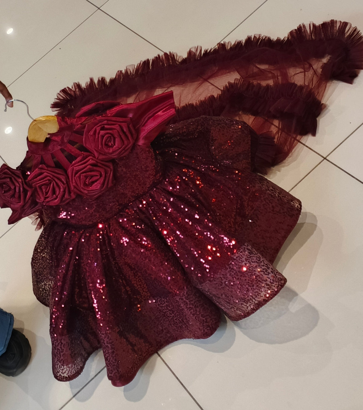 Elegant layered petal-style skirt with 3D rose detailing